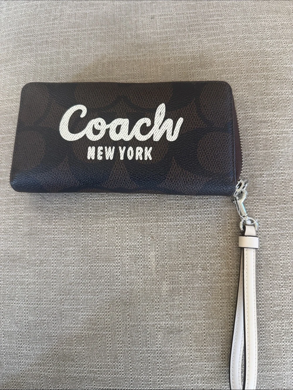 Coach Dark Brown Signature Zip Wristlet with Cream Logo and Strap
